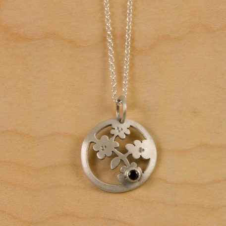 Nara Blossom Pendant with black stone.