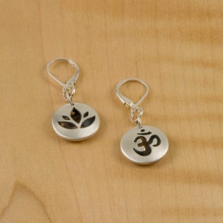 Sanskrit-inspired Earrings with a lotus and om symbol.