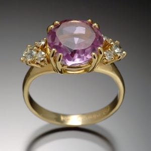A custom amethyst and diamond ring.