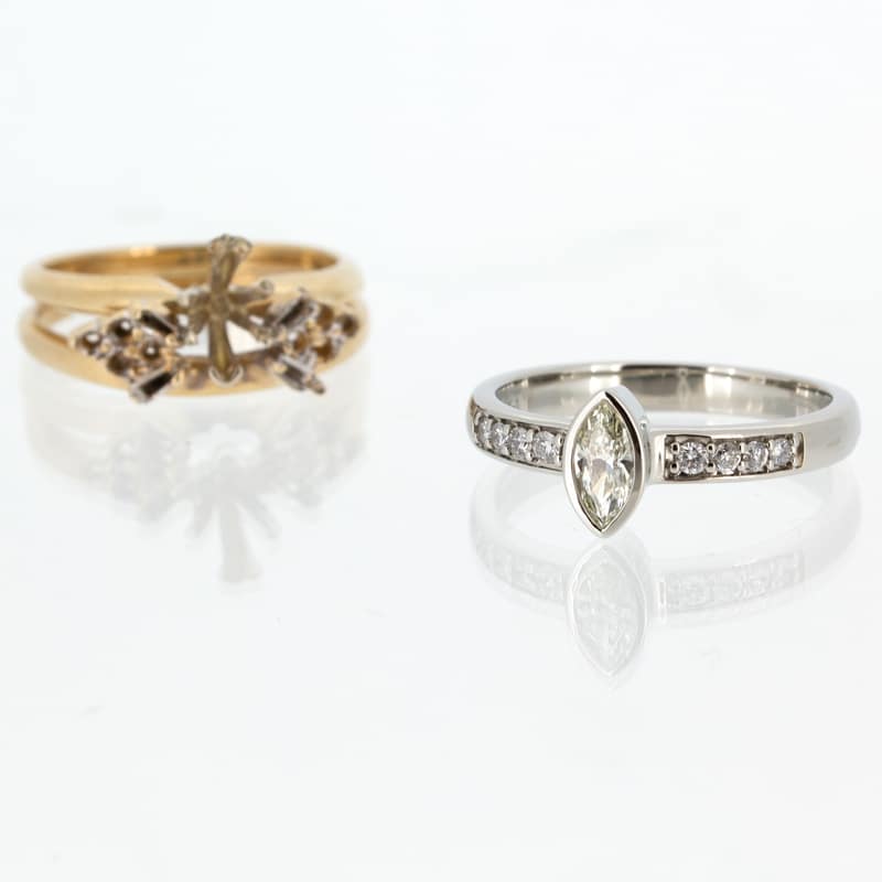 A pair of custom gold and diamond rings.